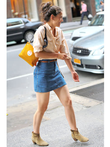 <div class="caption-credit"> Photo by: Jackson Lee/Splash News</div><div class="caption-title">Katie Holmes</div>There's a little '80s throwback happening here with the denim skirt and button down Katie's wearing. And we like it. <br>