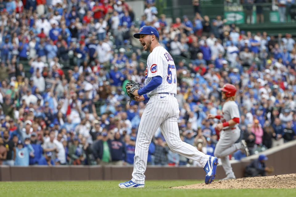 Chicago Cubs relief pitcher Scott Effross reacts after striking out St. Louis Cardinals' Tommy Edman with the bases loaded during the seventh inning of the first baseball game of a doubleheader, Saturday, June 4, 2022, in Chicago. (AP Photo/Kamil Krzaczynski)