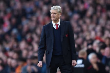 Britain Football Soccer - Arsenal v Norwich City - Barclays Premier League - Emirates Stadium - 30/4/16 Arsenal manager Arsene Wenger celebrates after Danny Welbeck scored their first goal Action Images via Reuters / Tony O'Brien Livepic