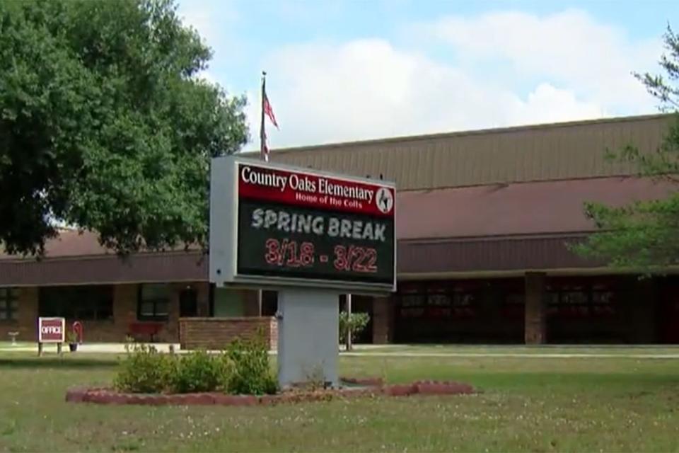 <p>ABC7 SWFL/Youtube</p> Country Oaks Elementary School in Port LaBelle, Fla., where two 10-year-olds were arrested for a gun sale last week.