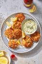 <p>Crab cakes are the ideal dish to cook in the air fryer because you want that crispy texture all around without ending up with an oil-logged cake. </p>Get the recipe from <a href="https://www.delish.com/cooking/recipe-ideas/a38175659/air-fryer-crab-cakes-recipe/" rel="nofollow noopener" target="_blank" data-ylk="slk:Delish" class="link ">Delish</a>.