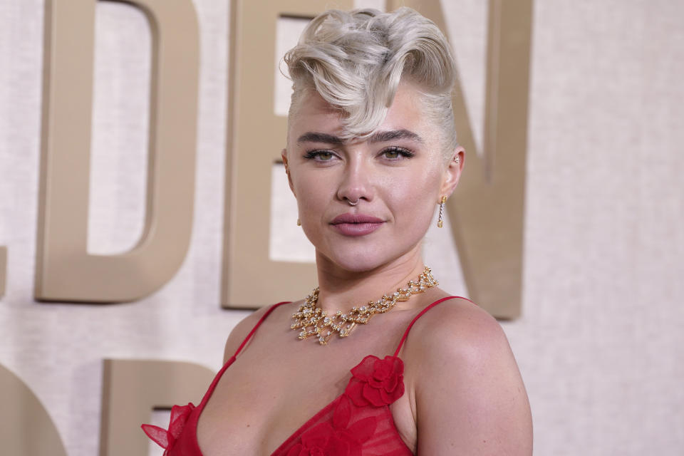 Florence Pugh arrives at the 81st Golden Globe Awards on Sunday, Jan. 7, 2024, at the Beverly Hilton in Beverly Hills, Calif. (Photo by Jordan Strauss/Invision/AP)