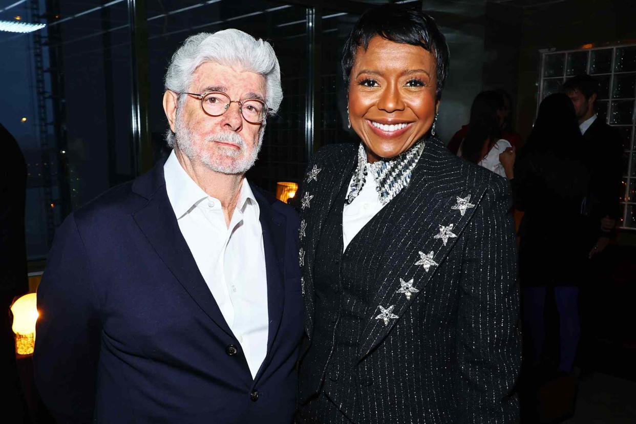 <p>Theo Wargo/Getty</p> George Lucas (left) and Mellody Hobson