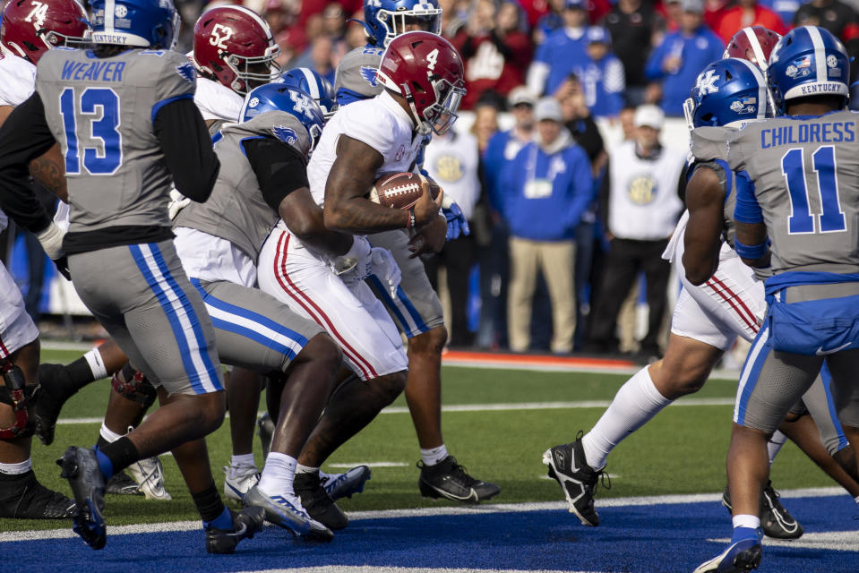 Alabama quarterback Jalen Milroe (4) walks into the end zone during the second half of an NCAA college football game against Kentucky in Lexington, Ky., Saturday, Nov. 11, 2023. (AP Photo/Michelle Haas Hutchins)