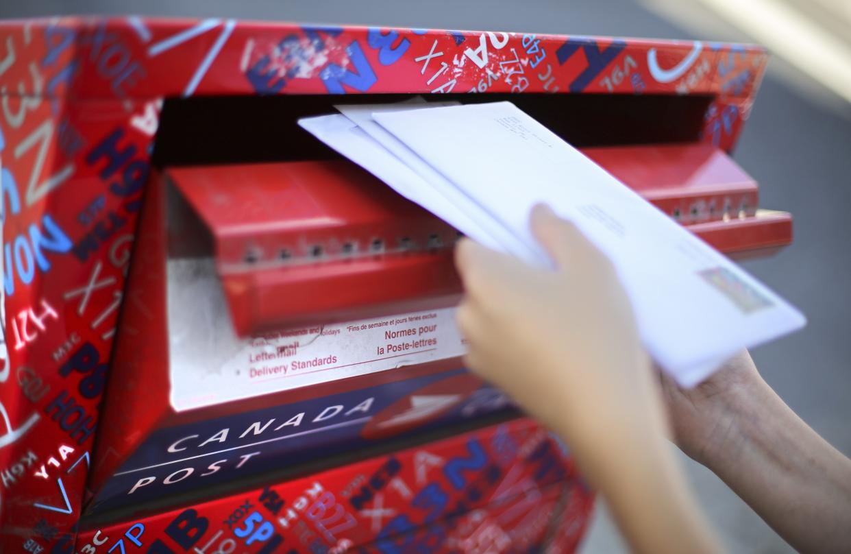 A Canada Post employee in Alberta was arrested after stealing more than 500 pieces of mail from residents. (Richard Lautens/Toronto Star via Getty Images)