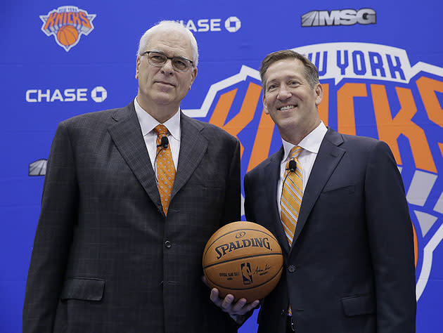 Phil Jackson and Jeff Hornacek stand tall. (Getty Images)