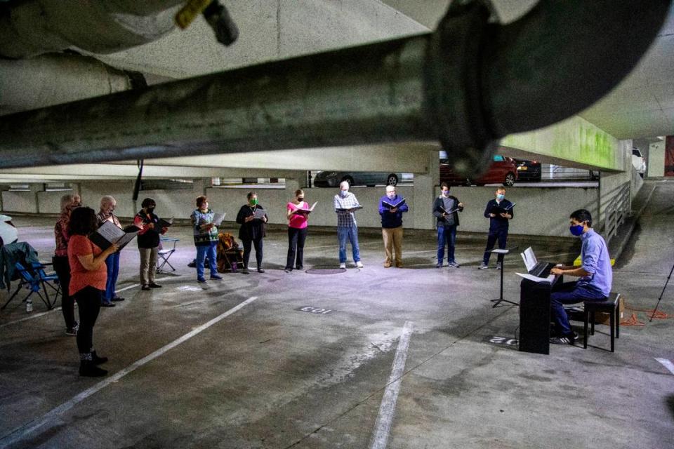 University Presbyterian Church Chapel Hill’s choir rehearses for the Easter 2021 worship services on Wednesday, March. 24, 2021at the James C Wallace Parking Deck in Chapel Hill. Easter will mark only the second time the church has held in-person worship since the beginning of the pandemic.