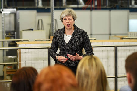 Britain's Prime Minister, Theresa May, addresses staff at GlaxoSmithKline toothpaste factory in Maidenhead, April 21, 2017. REUTERS/Leon Neal/Pool