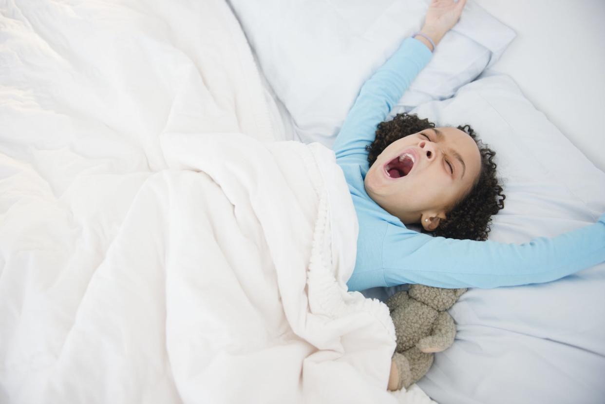 <span class="caption">Rise and shine!</span> <span class="attribution"><a class="link " href="https://www.gettyimages.com/detail/photo/african-american-girl-waking-up-in-bed-royalty-free-image/136801937" rel="nofollow noopener" target="_blank" data-ylk="slk:JGI/Jamie Grill via Getty Images;elm:context_link;itc:0;sec:content-canvas">JGI/Jamie Grill via Getty Images</a></span>