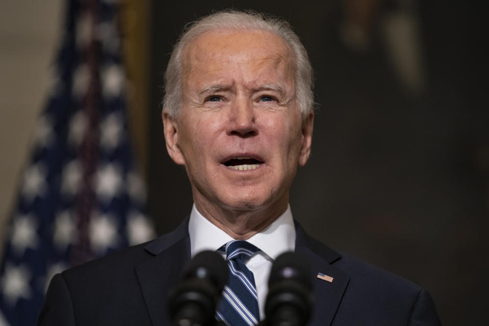 President Joe Biden delivers remarks on climate change and green jobs, in the State Dining Room of the White House, Wednesday, Jan. 27, 2021, in Washington. (AP Photo/Evan Vucci)