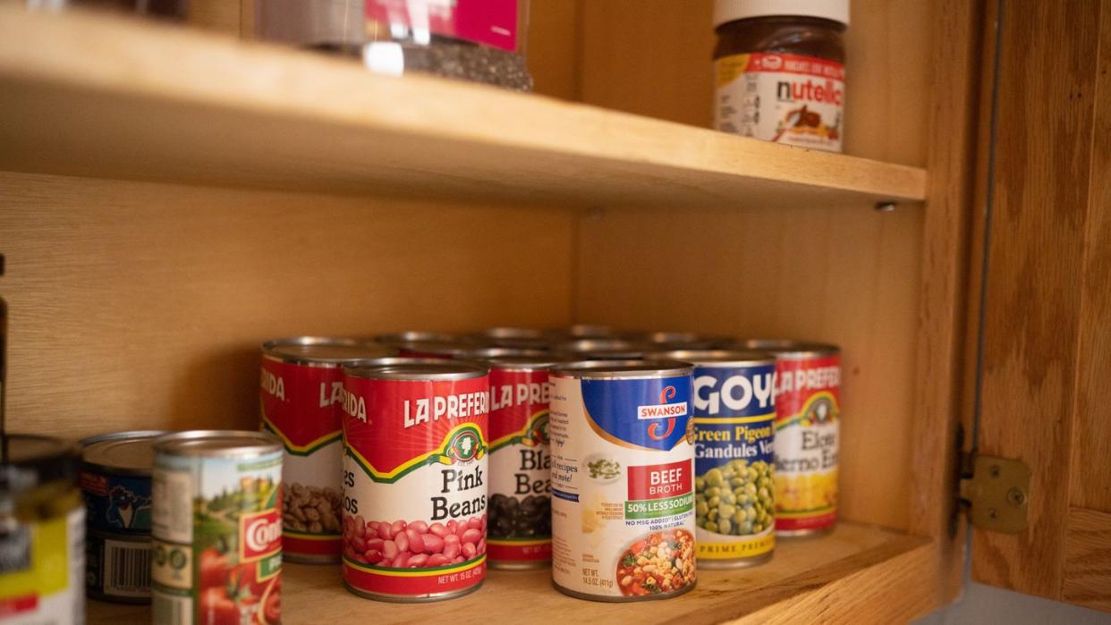 canned goods on kitchen pantry shelf