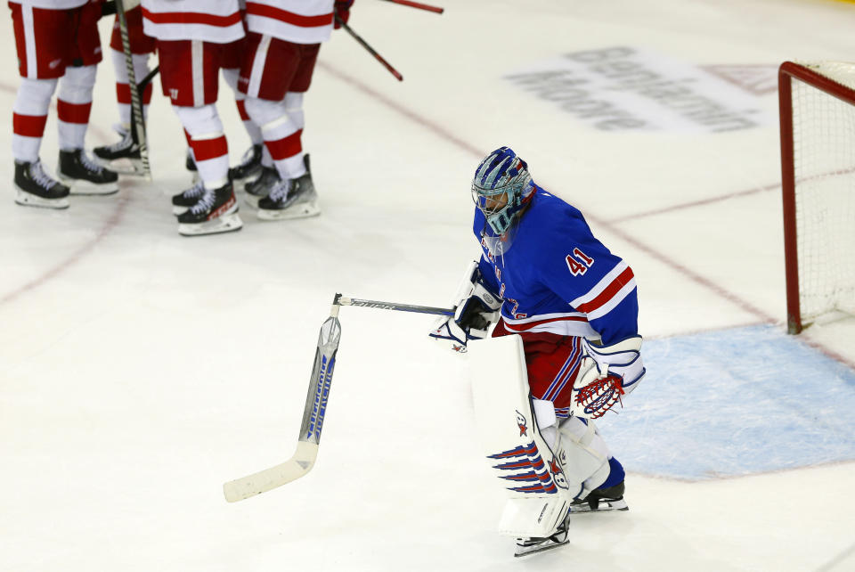 CORRECTS BY REMOVING THIRD PERIOD - New York Rangers goalie Jaroslav Halak skates back to the bench with the stick he broke after giving up the winning goal in overtime to the Detroit Red Wings during an NHL hockey game Sunday, Nov. 6, 2022, in New York. (AP Photo/John Munson)