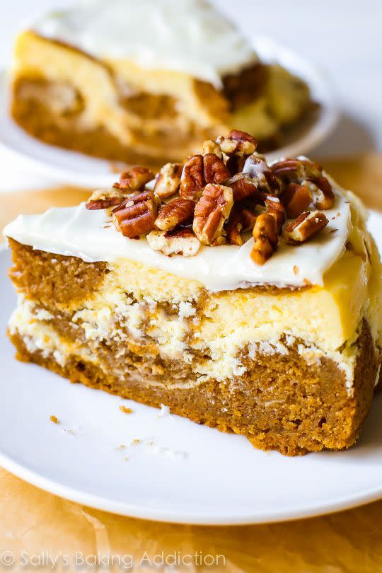 <p>You get a two-for-one deal with this dessert. Swirled cheesecake and pumpkin cake is truly the best of both worlds. </p><p><strong><em>Get the recipe at <a href="http://sallysbakingaddiction.com/2014/09/23/pumpkin-cake-cheesecake/" rel="nofollow noopener" target="_blank" data-ylk="slk:Sally's Baking Addiction;elm:context_link;itc:0;sec:content-canvas" class="link ">Sally's Baking Addiction</a>.</em></strong></p>