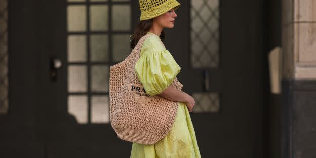 street style berlin august, 2022 to illustrate a guide to the best raffia tote bags