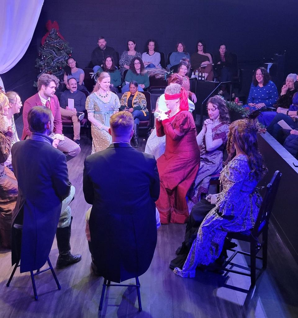 The cast of Oklahoma Shakespeare in the Park's 2022 production of "Jane Austen's Christmas Cracker" plays the Regency Era game Squeal, Piggy, Squeal during the opening-night performance Dec. 9, 2022, in the company's Paseo Arts District black box theater.