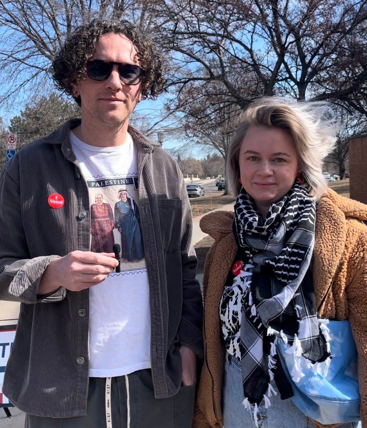 Timothy Frost (left) and Molly Hale (right) of St. Paul, Minne. cast their presidential nominating ballots on March 5, 2024 for 'uncommitted' in protest of President Joe Biden's refusal to call a ceasefire in Gaza.