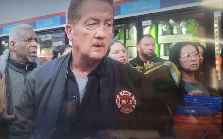 Dee-Mack resident Alex Timmerman (back, at cooler) was a background actor in this Season 12, Episode 3 grocery store accident scene in NBC's hit show, Chicago Fire.