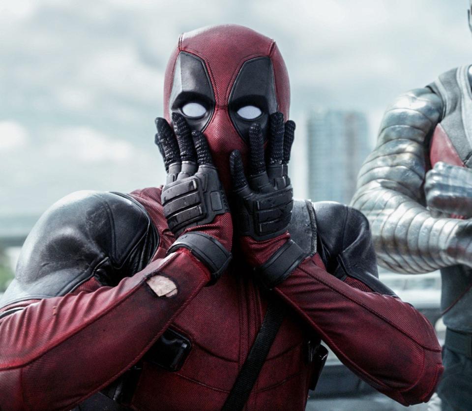 Deadpool with his hands on his cheeks