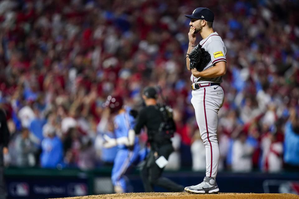 Atlanta Braves starting pitcher Spencer Strider reacts after giving up a home run to Philadelphia Phillies' Nick Castellanos during the fourth inning of Game 4 of a baseball NL Division Series Thursday, Oct. 12, 2023, in Philadelphia. (AP Photo/Chris Szagola)