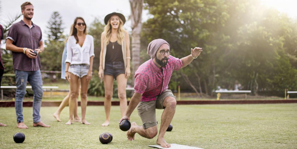 playing lawn bowling