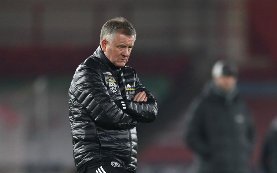 Chris Wilder, Manager of Sheffield United looks on during the warm up prior to the Premier League match between Sheffield United and Liverpool at Bramall Lane on February 28, 2021 in Sheffield - GETTY IMAGES