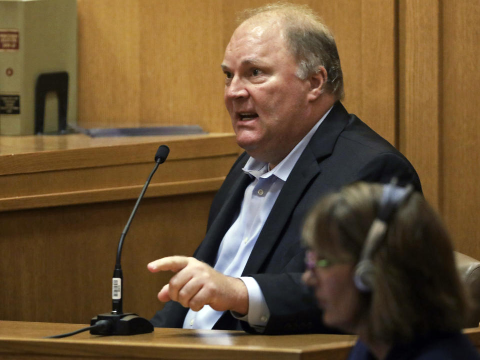 Former Wisconsin Supreme Court Justice Michael Gableman, an investigator hired by Republicans to look into former President Donald Trump's 2020 loss in the battleground state, takes the stand and refuses to answer questions from Circuit Court Judge Frank Remington, Friday, June 10, 2022, at the Dane County Courthouse in Madison, Wis. Gableman was found in contempt after he berated the judge and refused to answer any questions on the witness stand. (Amber Arnold/Wisconsin State Journal via AP)