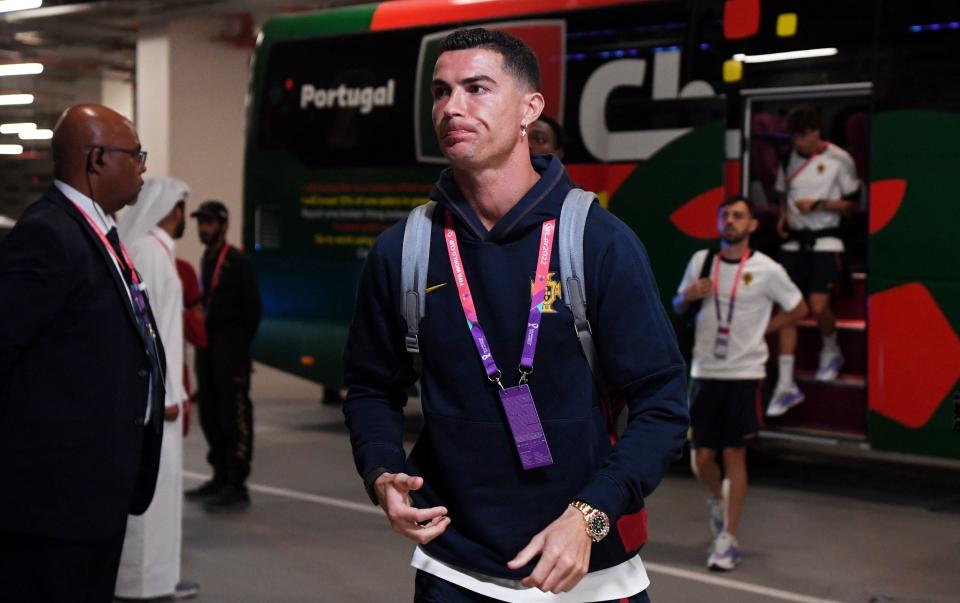Emotion shows through on Ronaldo's face as he arrives at Lusail Stadium, left out of the starting XI - Mike Hewitt/Getty Images