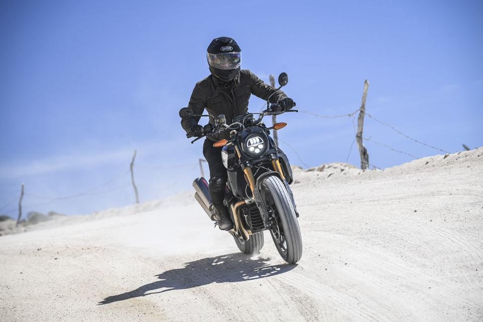 <p>With around 40 miles of dirt riding, standing on the foot pegs became our new favorite riding position. We would have loved the optional accessory ProTaper Rally handlebars for this portion of the ride.</p>