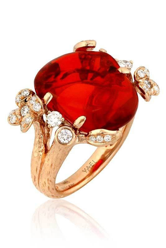 <p><em><a rel="nofollow noopener" href="https://www.yaeldesigns.com/fine-jewelry/collections/lava-fire-opal/bandai.html?___SID=U" target="_blank" data-ylk="slk:Fire Opal Bandai Ring;elm:context_link;itc:0;sec:content-canvas" class="link ">Fire Opal Bandai Ring</a>, YAEL DESIGNS, $4,931</em></p>