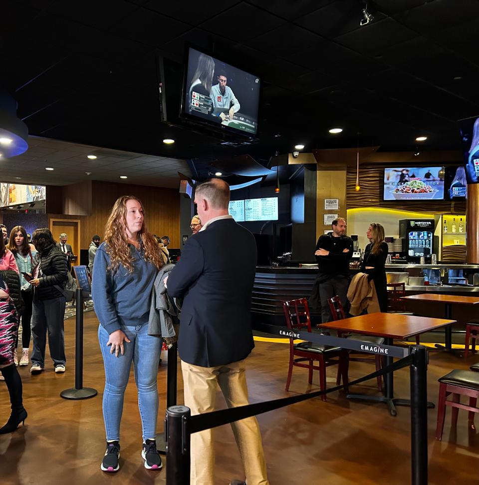 Actress Courtney Frye, 32, of Lansing, asks Marc Evan Jackson his advice for pursuing larger roles ahead of the charity "Mean Girls" screening on Saturday, March 31, 2024.