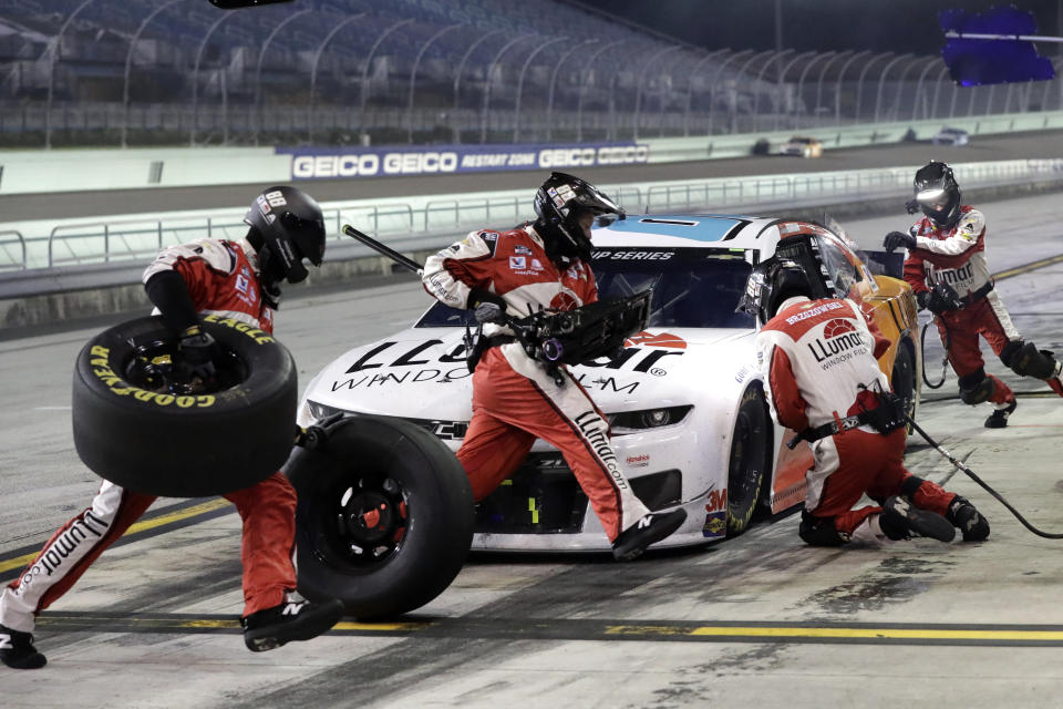Alex Bowman makes a pit stop during a NASCAR Cup Series auto race Sunday, June 14, 2020, in Homestead, Fla. (AP Photo/Wilfredo Lee)
