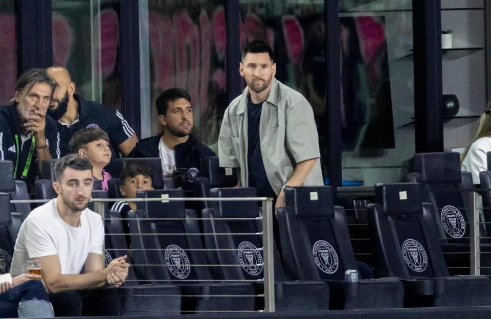 Inter Miami forward Lionel Messi looks from his seat in the first half of an MLS match against New York City FC at Chase Stadium on Saturday, March 30, 2024, in Fort Lauderdale, Fla.