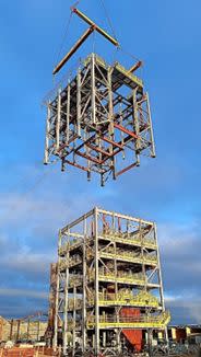 Hoisting of pre-assembled headframe at the Caraíba Operations' new external shaft in July 2023 (left).