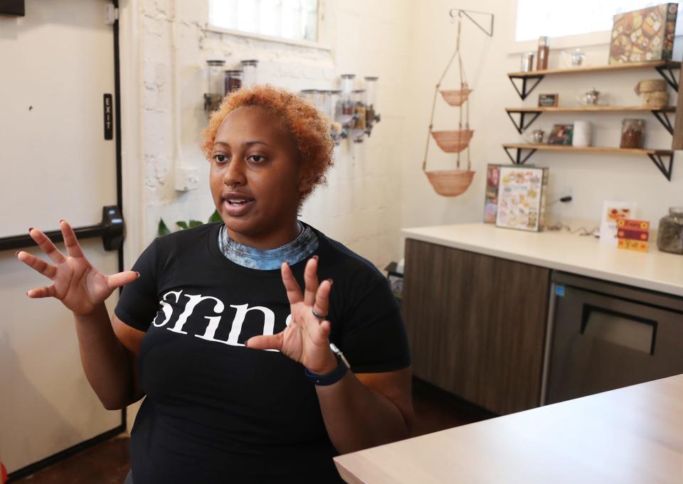 Jasmine Kirk talks about her job and work at SRINA Tea House & Café in the Kenmore neighborhood of Akron.