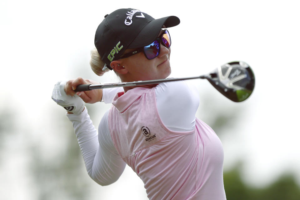 Madelene Sagstrom owes her caddie a few favors after this trick shot gone wrong. (AP Photo)