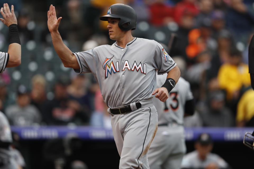 Miami Marlins catcher J.T. Realmuto (11) (AP Photo/David Zalubowski)