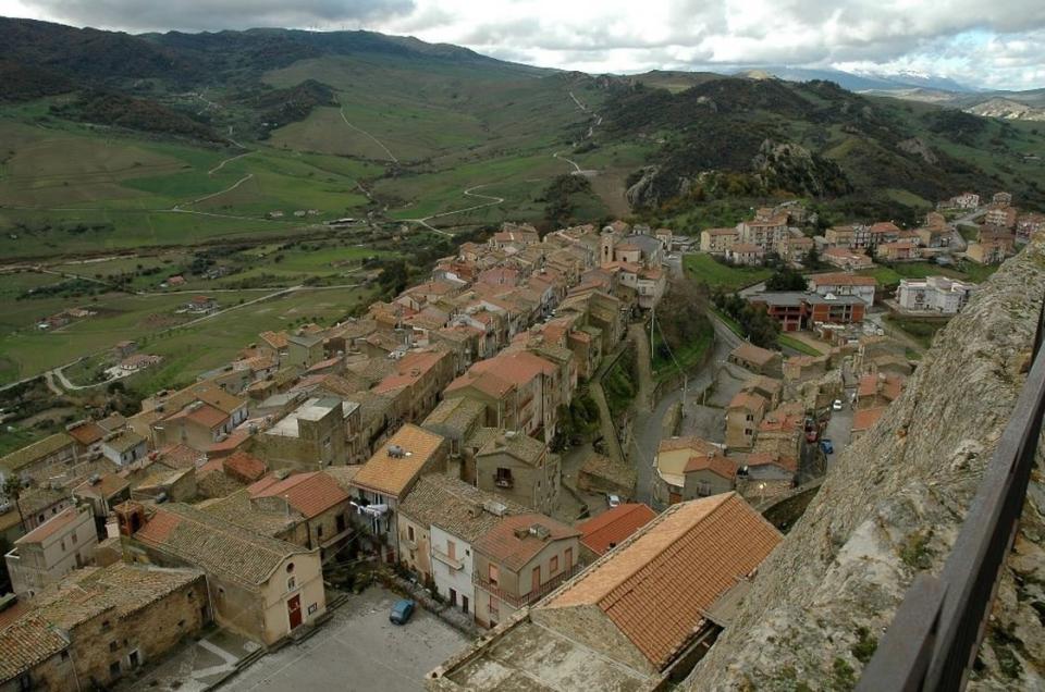 Nestled between two mountains in the heart of Sicily, Sperlinga is home to just 896 people. Its most noteworthy monument is its castle, a melange of Italy’s ancient heritage:<a href="http://www.castellodisperlinga.it/subpagina.php?idmenu=1&&idsubmenu=1" target="_blank"> initially a prehistoric mountainside excavation,</a> it was built up by Byzantine and Saracen occupiers until it was transformed into a castle by Normans around the year 1080. The village is surrounded by the Bosco di Sperlinga natural reserve, which embraces the rapid Salso river and is shaded by lush tamarisk trees.