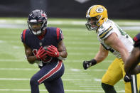 Houston Texans wide receiver Randall Cobb, left, catches a pass as Green Bay Packers linebacker Ty Summers defends during the second half of an NFL football game Sunday, Oct. 25, 2020, in Houston. (AP Photo/Eric Christian Smith)