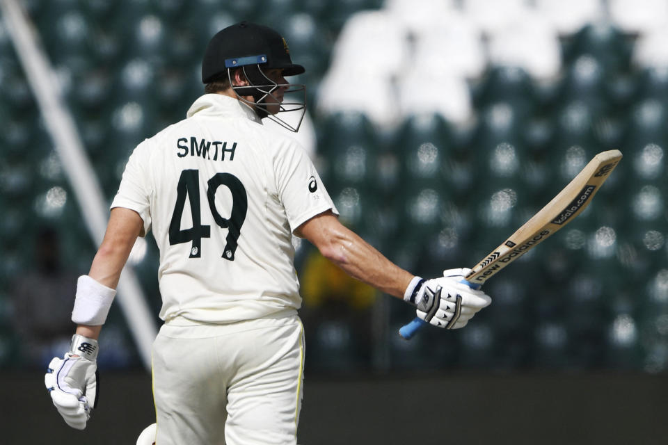 Steve Smith (pictured) celebrates after scoring a half-century.