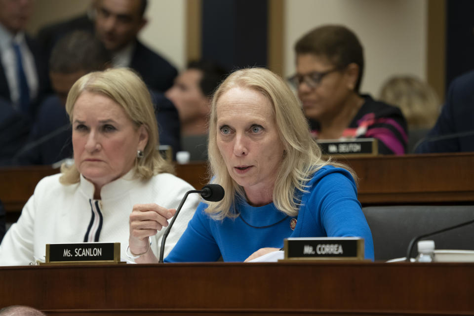 In this July 24, 2019 photo, Rep. Mary Gay Scanlon, D-Pa., right, joined at left by Rep. Sylvia Garcia, D-Texas, questions former special counsel Robert Mueller as he testifies to the House Judiciary Committee about his investigation into Russian interference in the 2016 election, on Capitol Hill in Washington. (AP Photo/J. Scott Applewhite)