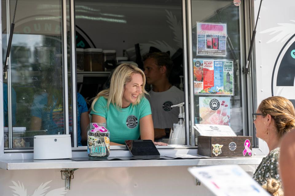 Katie Lorentz serves up some cold drinks to customers at GroundUp Coffee Bar in Mount Dora.