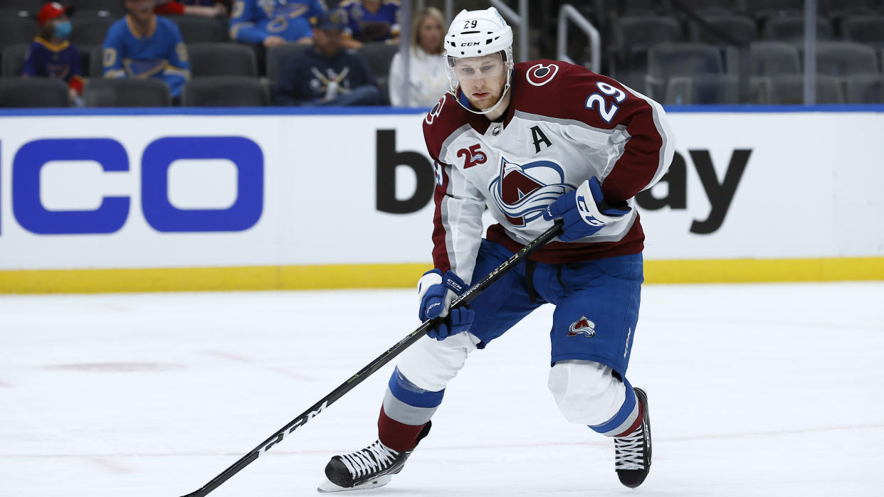 ST LOUIS, MISSOURI - MAY 21: Nathan MacKinnon #29 of the Colorado Avalanche controls the puck against the St. Louis Blues at Enterprise Center on May 21, 2021 in St Louis, Missouri. (Photo by Tom Pennington/Getty Images)