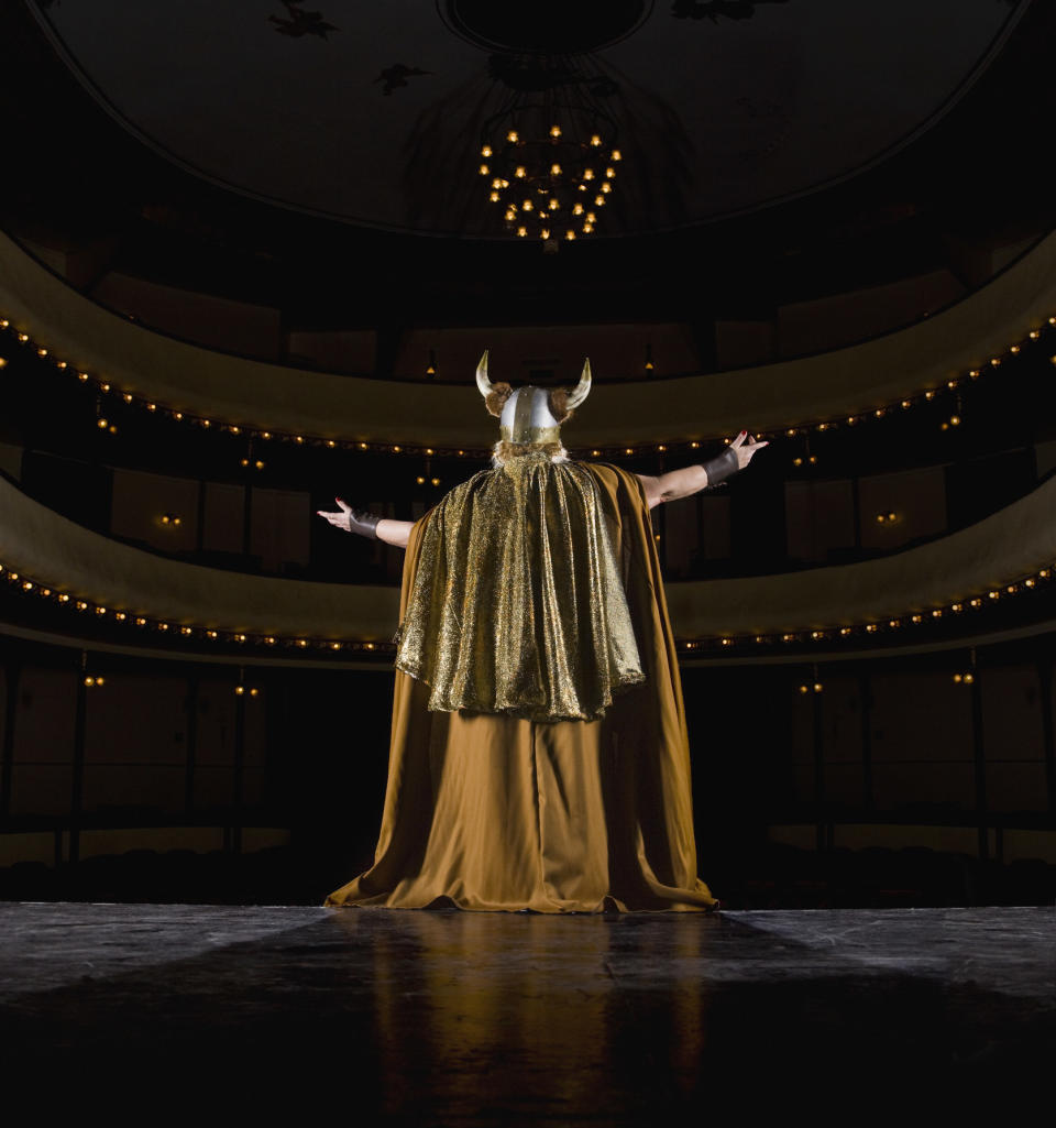 an opera signer wearing a horned helmet