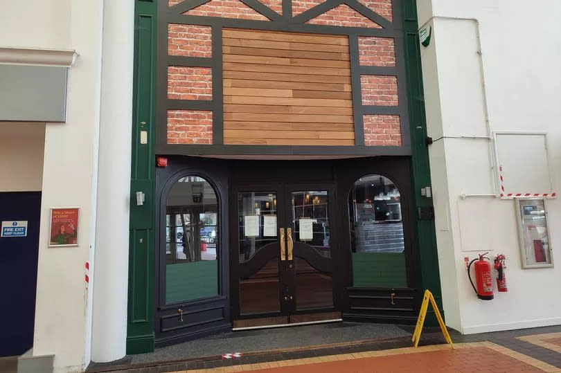 A set of doors leading to a bar