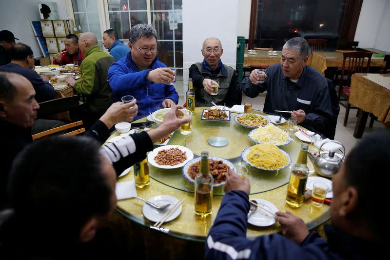 The Wider Image: On a frozen pond far from the Olympics, meet China's ice hockey veterans