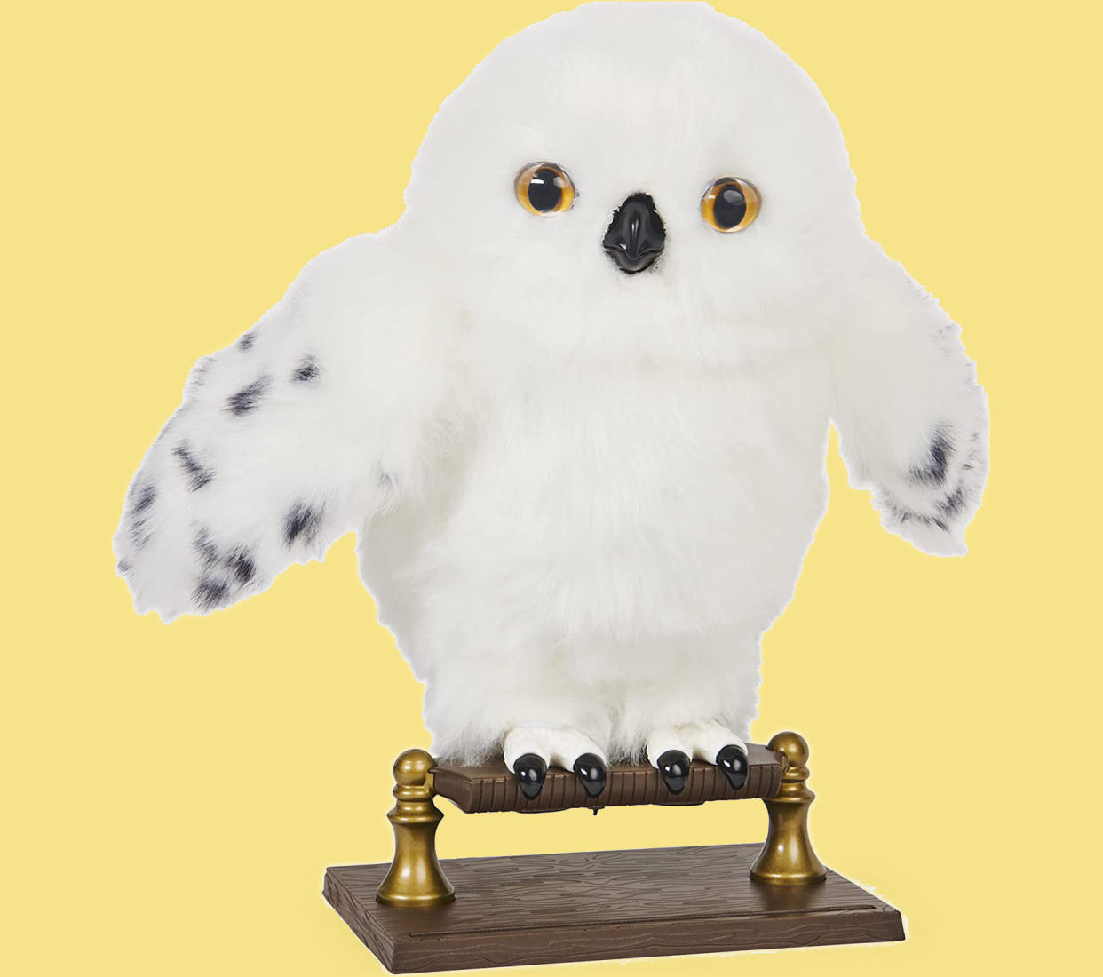 Enchanting Hedwig Interactive Owl sitting on perch