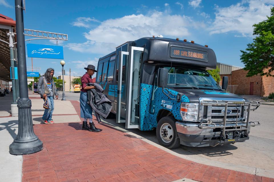 Passengers load up on the Bustang Outrider Bus for a trip to Trinidad at the Pueblo Transit Center on Thursday, June 22, 2023.