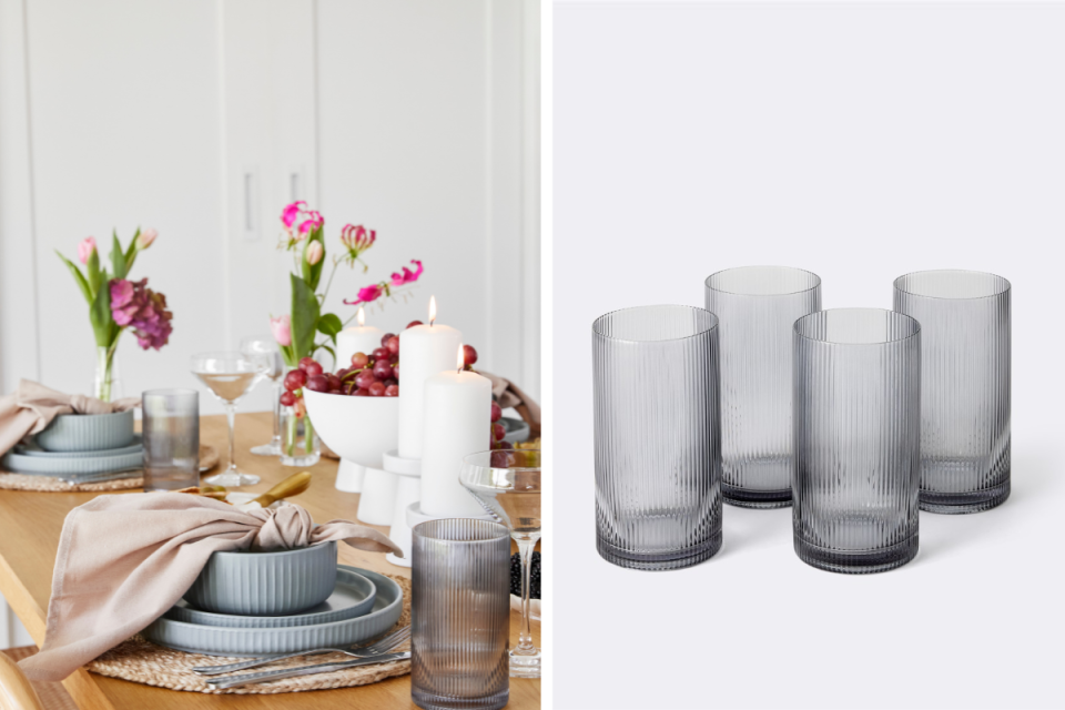 L: Tablescape set up with BIG W bowls, plates, candles, flowers and napkins. R: Set of 4 grey ribbed BIG W tumblers on a grey background