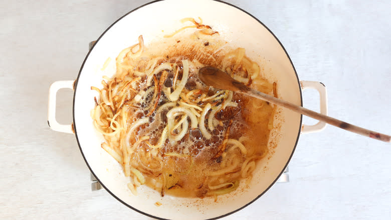 sauteed onions in a pan