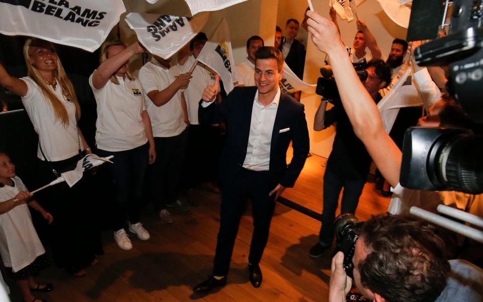 Dries Van Langenhove on election night at a meeting of Vlaams Belang supporters.  - REX
